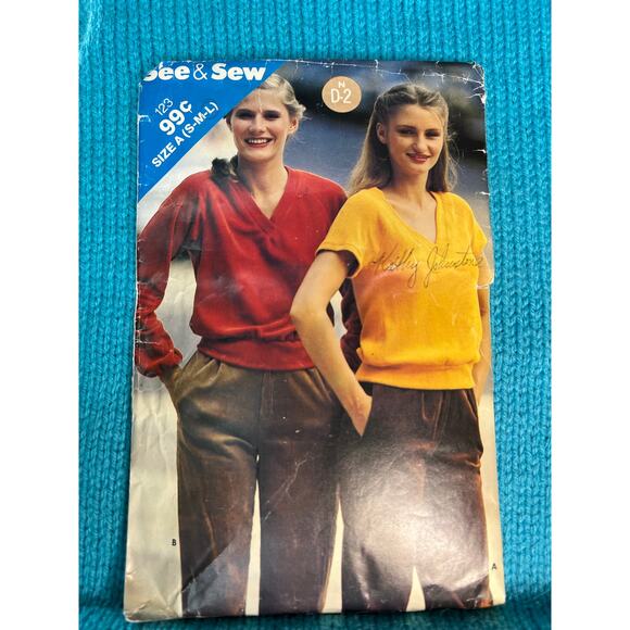 Butterick Sewing pattern 123 pullover top V neck size S M L - Picture 1 of 5